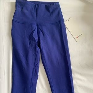 Never worn Lululemon leggings - size 0 in cobalt blue